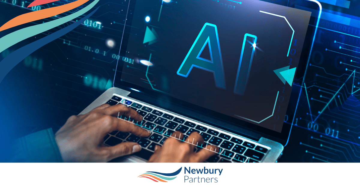 Hands typing on laptop with AI interface displaying artificial intelligence technology for staffing.