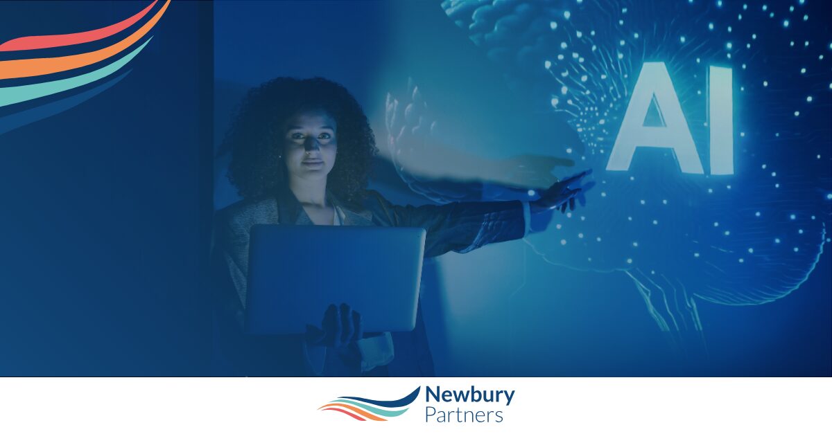 Professional working on laptop managing AI overload staffing challenges with digital AI interface display.