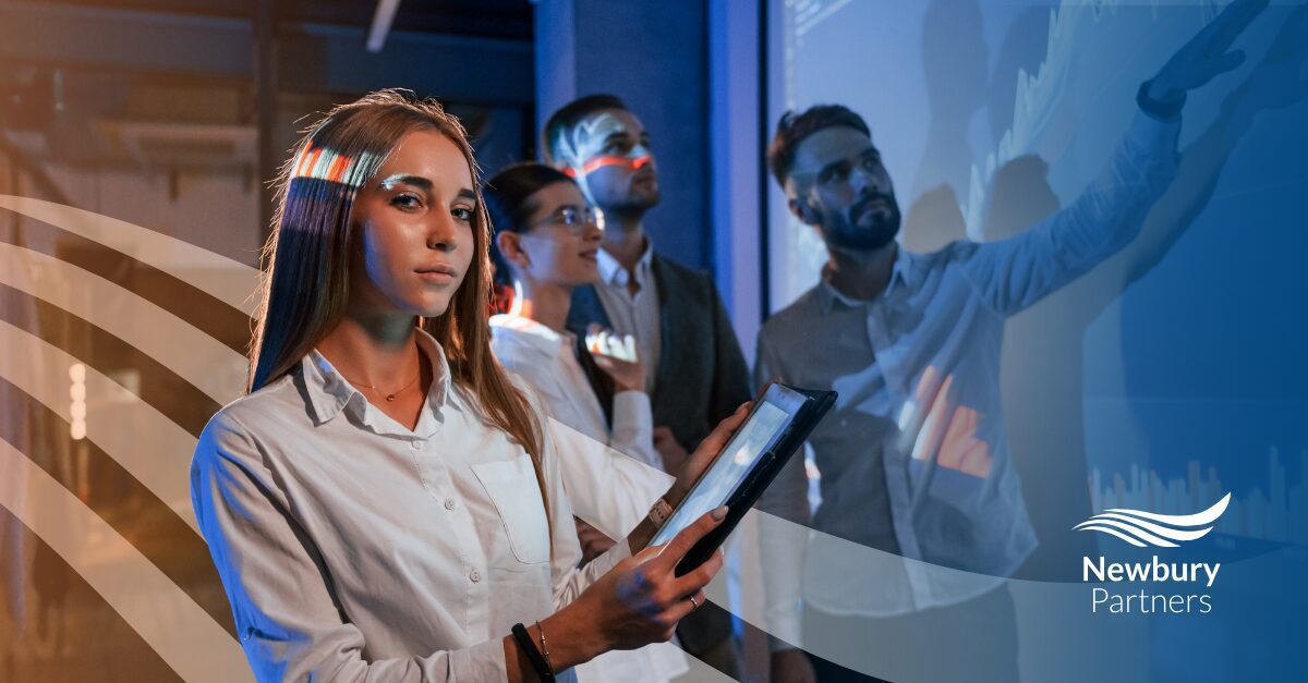 Team setting staffing tech goals with digital tools and analytics for 2026 implementation strategy.