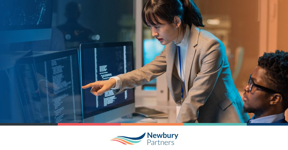 Staffing professionals reviewing HubSpot workflows to streamline recruitment tasks