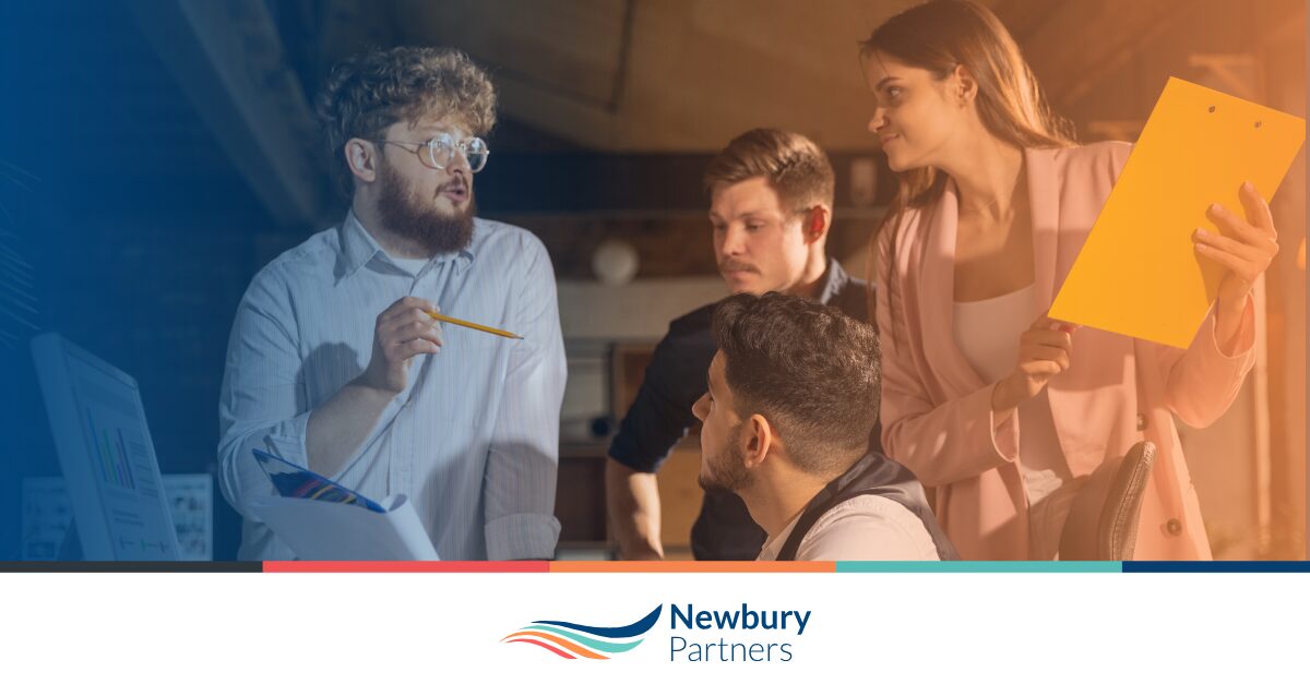 A team reviewing staffing BI dashboards to analyze performance and trends.