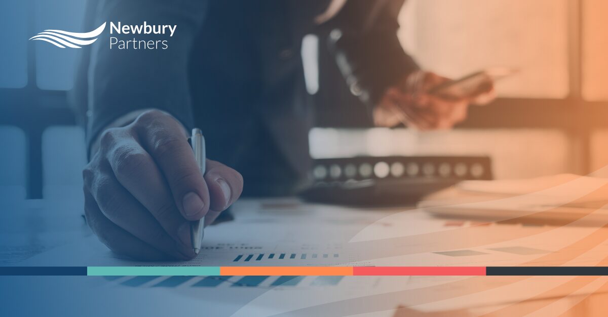 Staffing operations leader reviewing reports and data as part of a HubSpot CRM audit process.