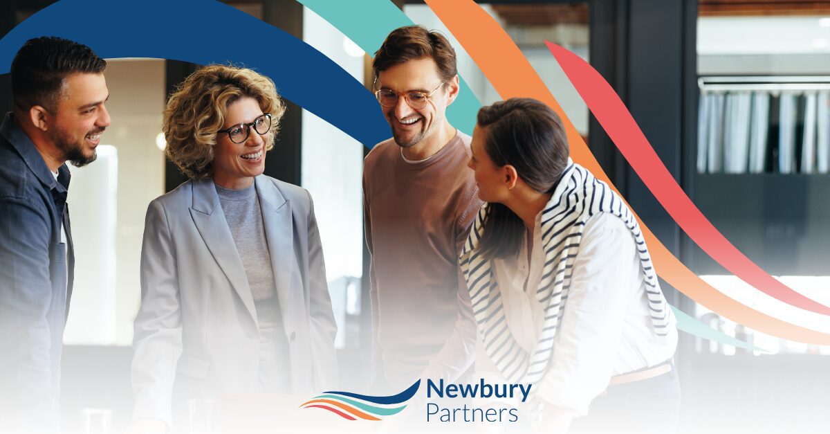 Four staffing professionals collaborating and reviewing self-service BI staffing teams use daily.